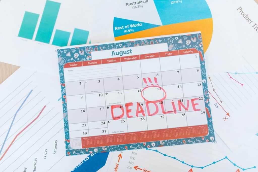 calendar showing business days in a month with deadline marked in red